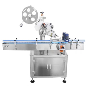 Top surface labeling machine