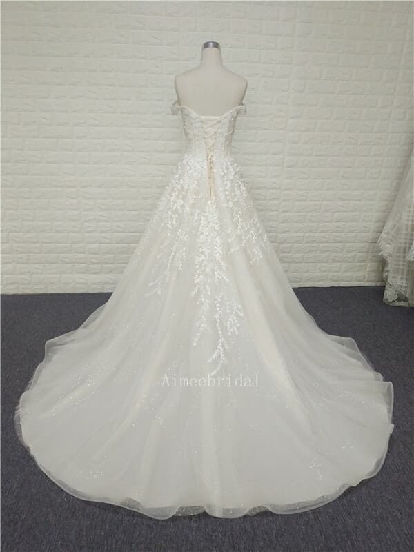 A-line off shoulder heart-shaped neck wedding gown chapel train glittery tulle on the satin /crystal beading appliques wedding dress  with lace up back .