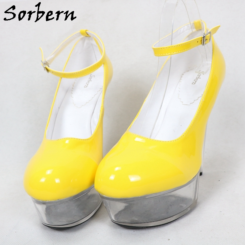 Bright Illuminating Yellow Shoes in Woman`s Hand on Gray Background. Stock  Photo - Image of overhead, christmas: 204837446