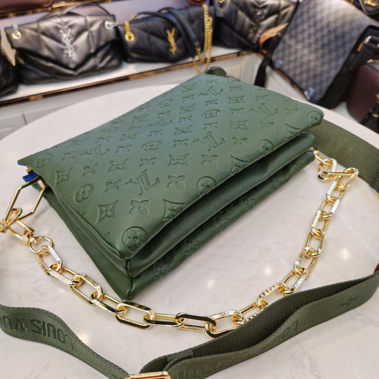 lv coussin bag green