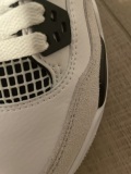 The back tab pops back up really fast and all stitching is perfect this shoe is not fake if u think this website is fake you are thinking wrong because this shoe is perfect no drawbacks