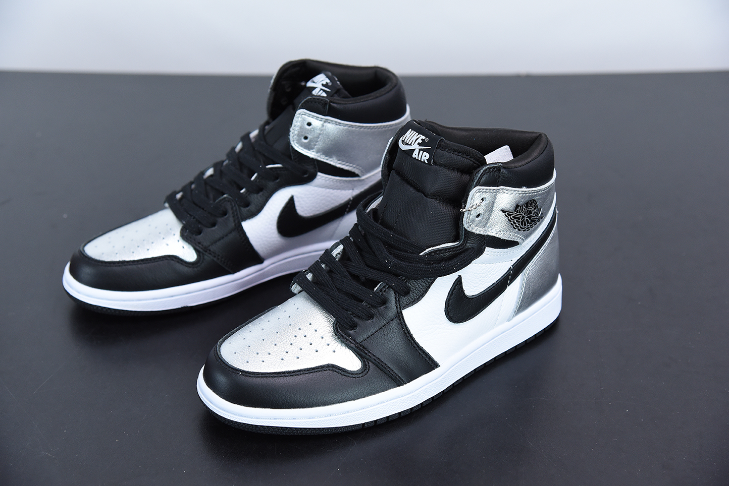 white and silver jordans 11