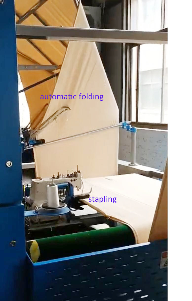 Automatic Edge Folding and Stapling for Fabric
