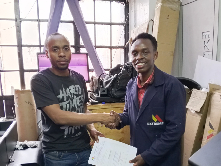 Kenya branch successfully sold and installed the integrated ST1802 sublimation flag machine