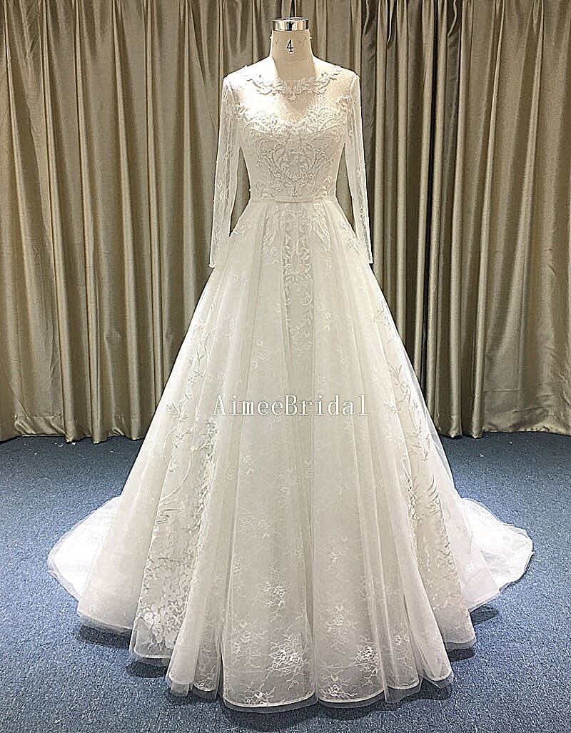A-line Jewel neckline court train long sleeves french lace sequin bridal wedding dress gown with low-cut back.