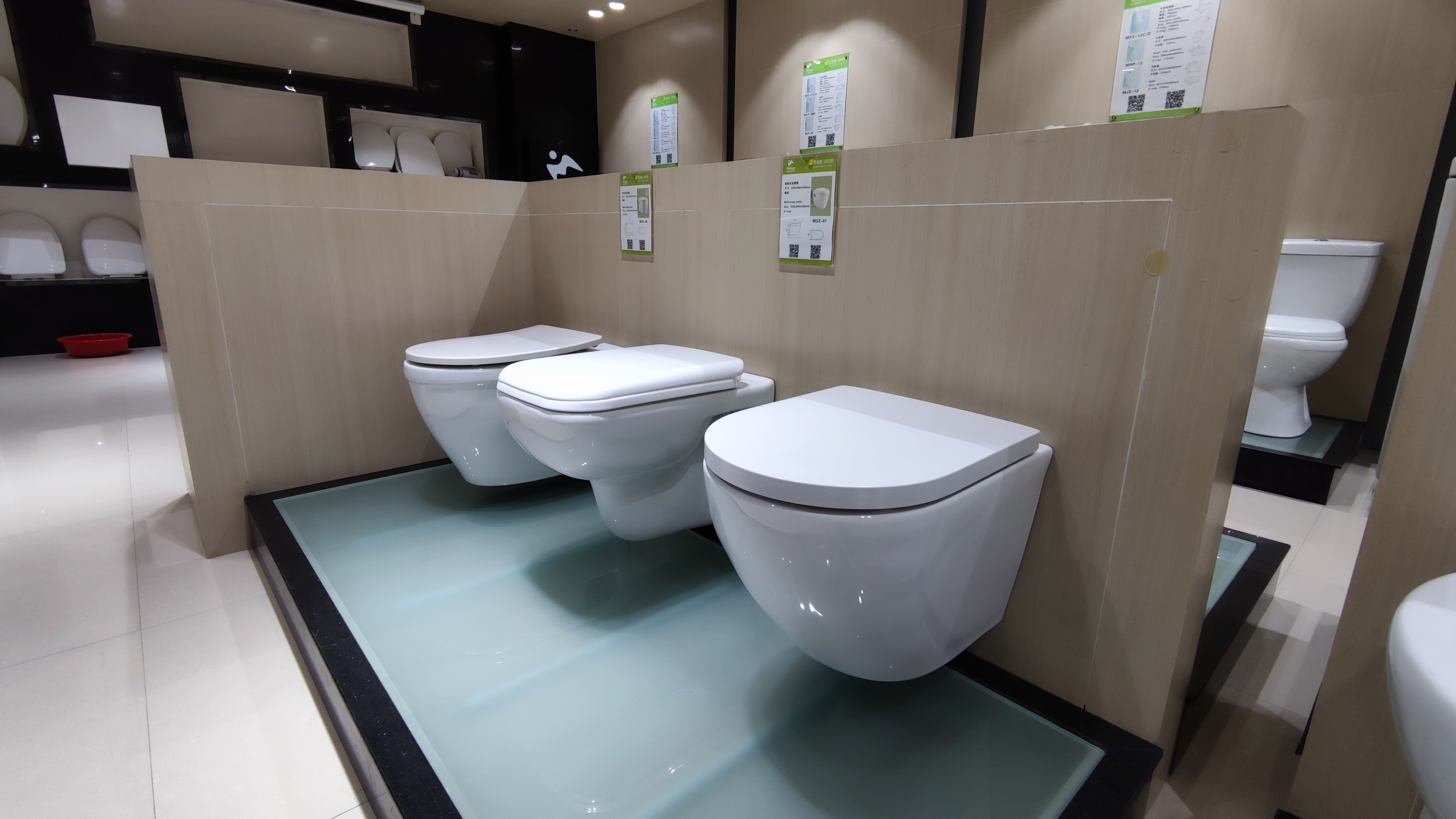 Modern one-piece toilet in a clean bathroom setting, demonstrating seamless design
