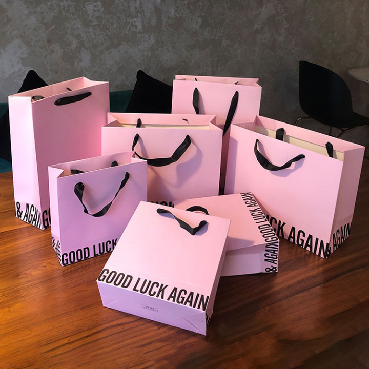 Wholesale Recyclable Pink Paper Shopping Bags with Printed Logo 