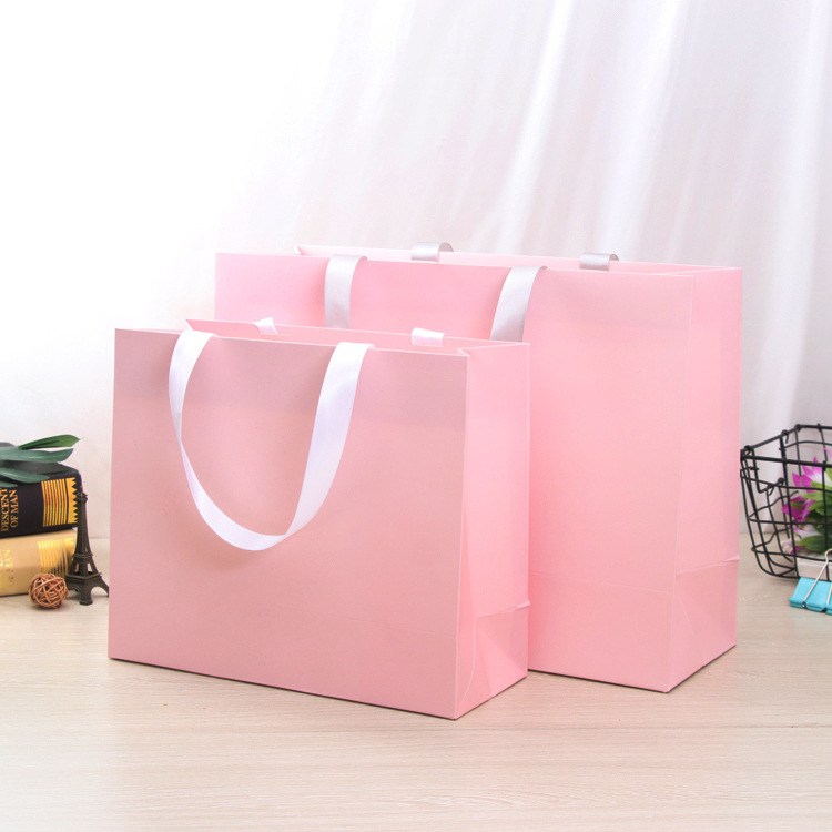 Wholesale Recyclable Pink Paper Shopping Bags with Printed Logo 