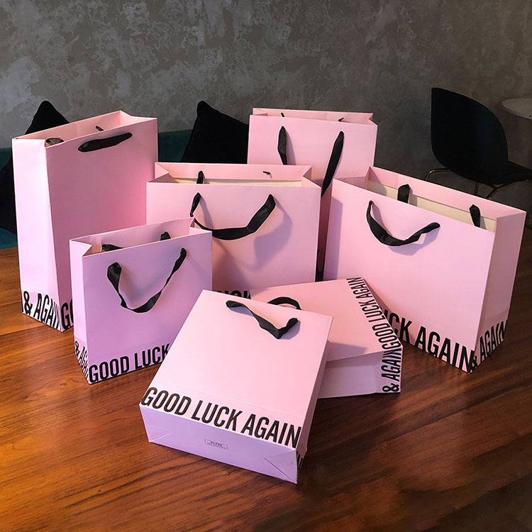 Wholesale Recyclable Pink Paper Shopping Bags with Printed Logo 