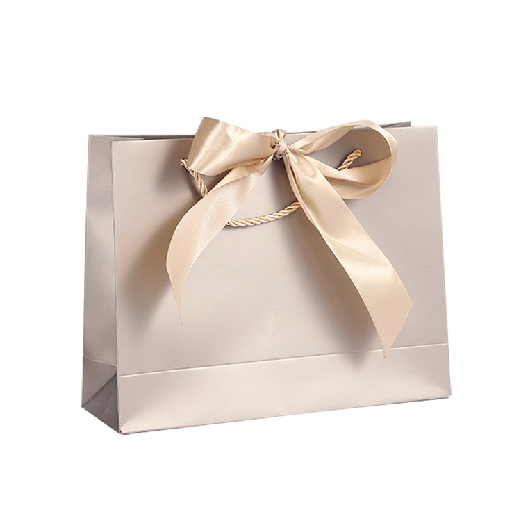 Wholesale & Customizable Elegant Beige Paper Gift Bag with Ribbon Bow