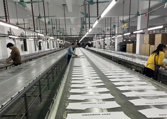 Screen printing production line in the JK Covers printing workshop
