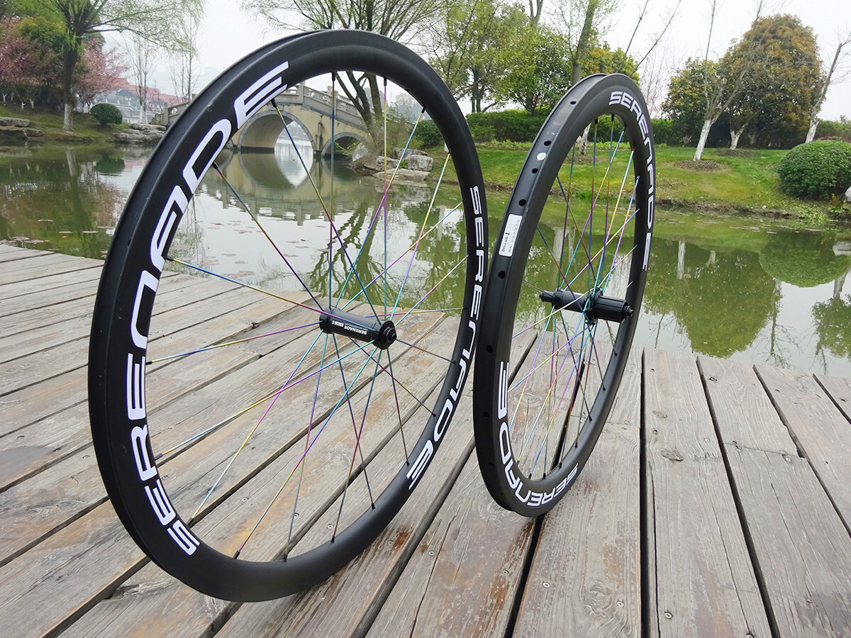 700c 38mm clincher with 50mm carbon road bike wheels serenade straight hubs used Titanium spokes 700c 38mm clincher with 50mm carbon road bike wheels used Ti spokes