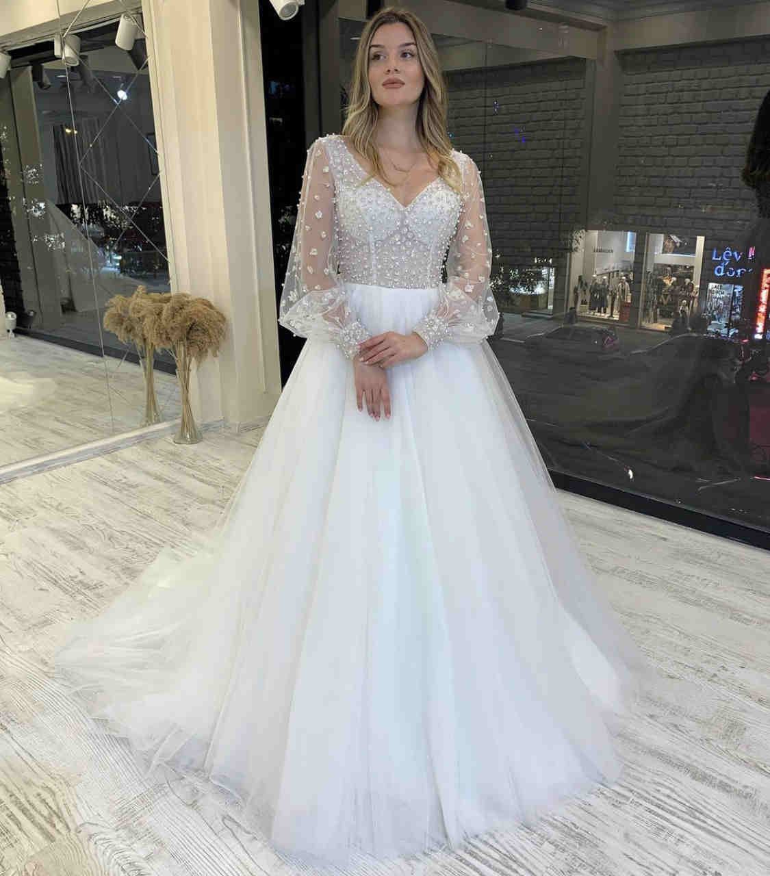 White Illusion Long Sleeves Wedding Dress with Beaded Top