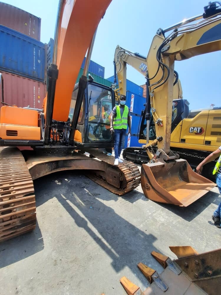 Am I cool? Customer finally found his excavactor in port